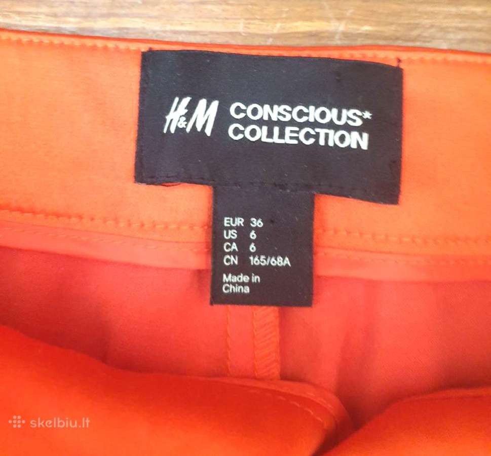 Ryškiai oranžinės H&m kelnės S/m – stilingas akcen