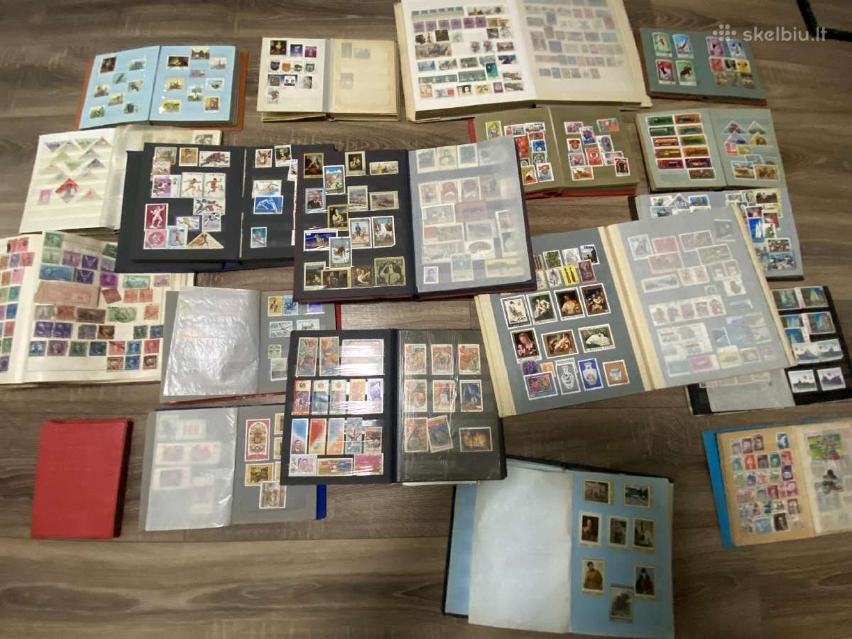 17 pašto ženklų albumų