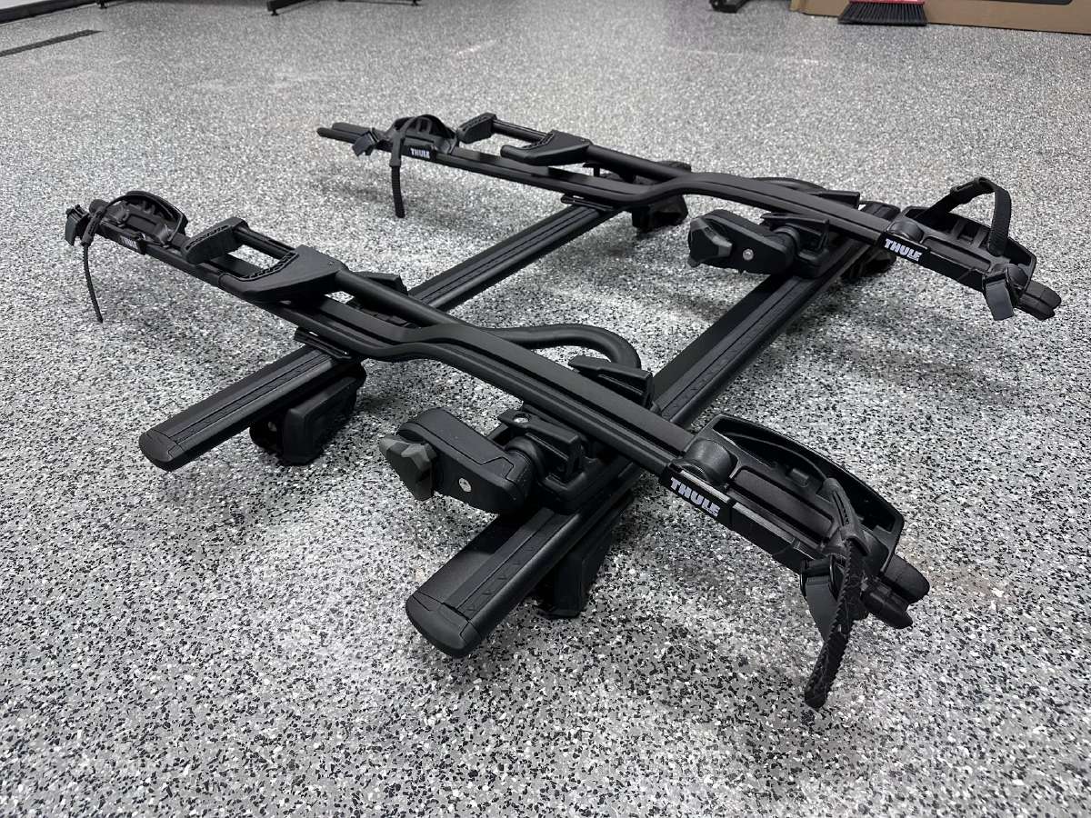 Thule EVO Raised Rail + Thule Proride 598 2vnt