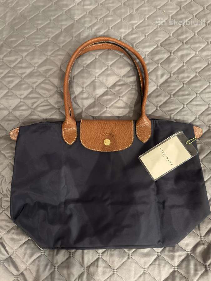 Longchamp tase,rankinukas.