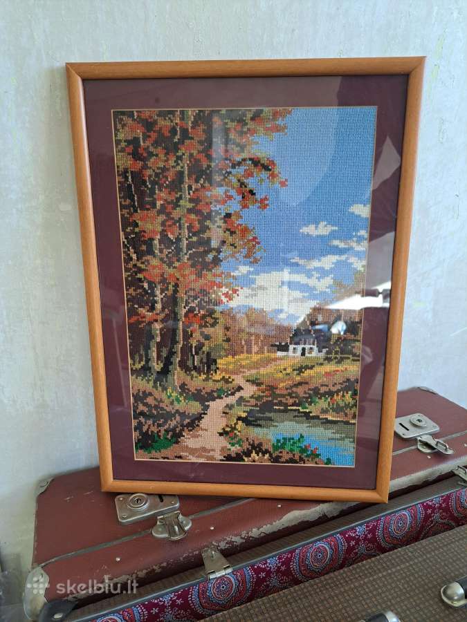 Kryželiu siuvinėtas rudens peizažas.