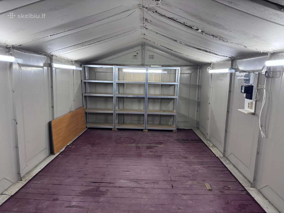 Metalinis garažas nusikelimui su kilpomis