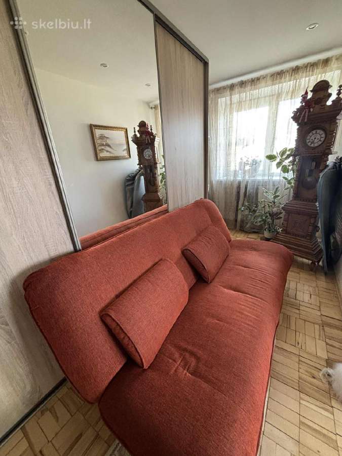 Dvigulė ištiesiama sofa