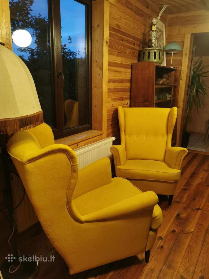 Du Ikea Strandmon geltoni foteliai