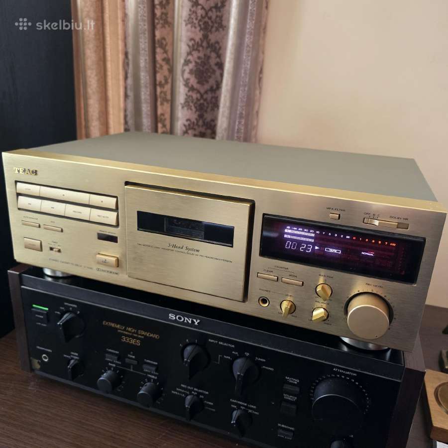 Teac V-1030 (3 galvuciu)