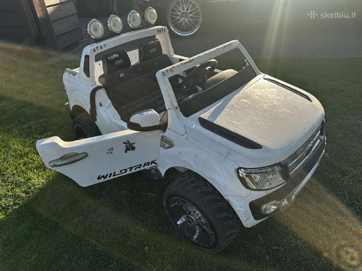 Vaikiškas elektrinis automobilis
