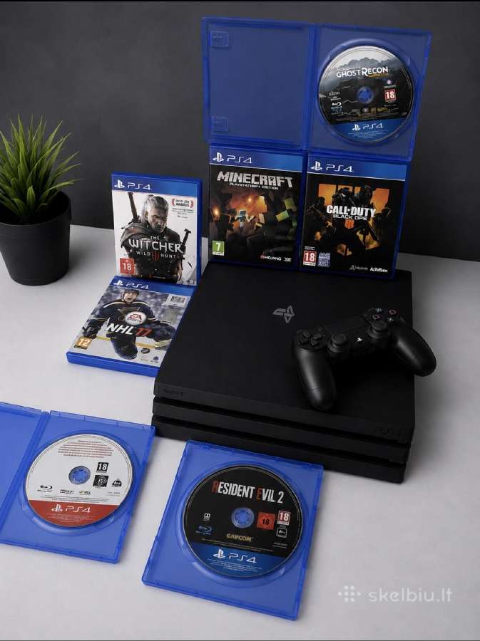 Playstation 4 Pro su žaidimais.