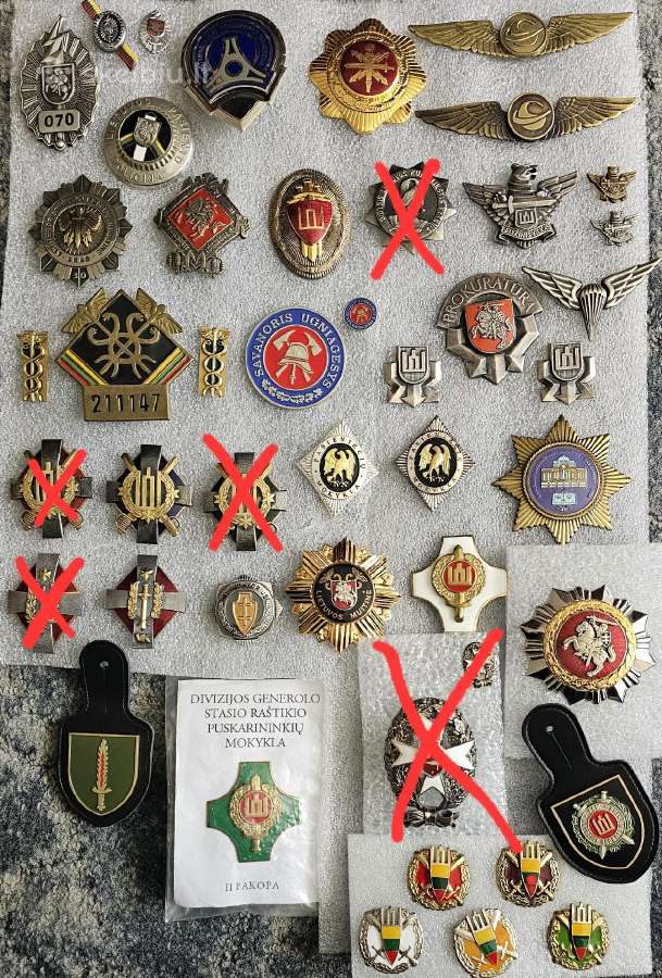 Krūtininiai ženklai.