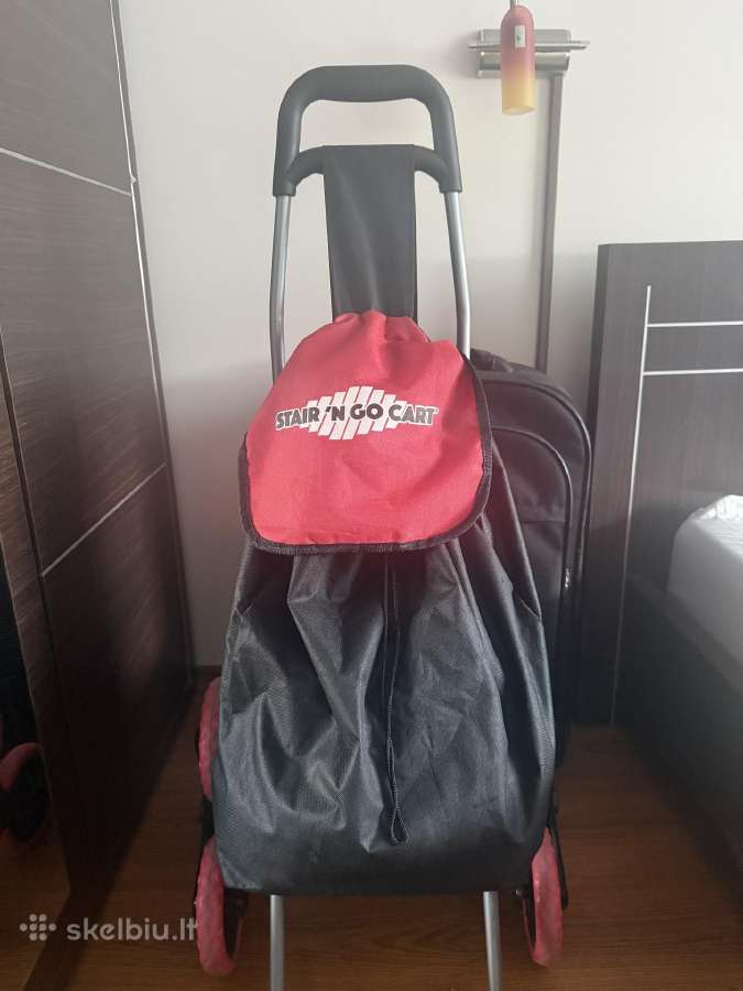 Pirkiniu krepsys su ratukais