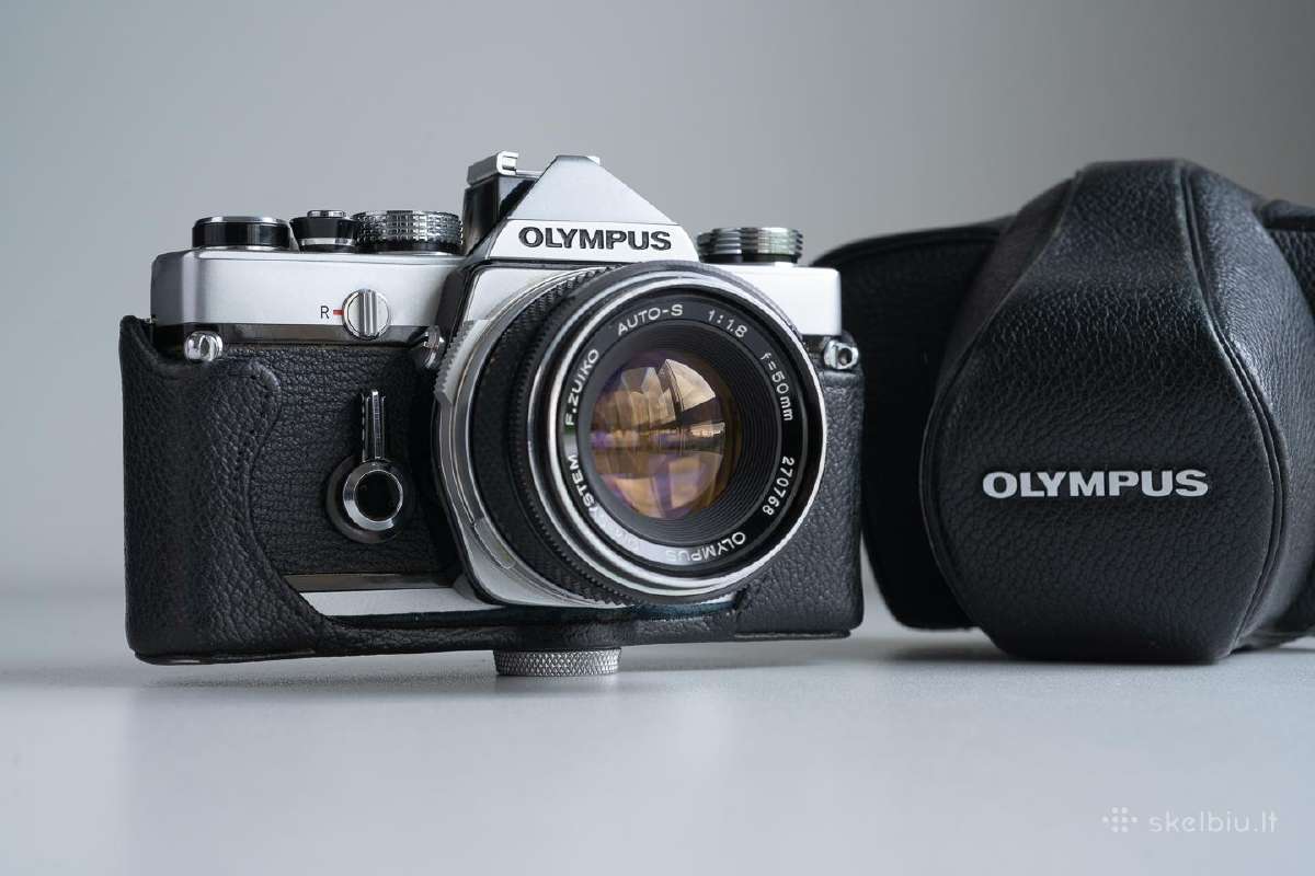 Juostinis fotoaparatas Olympus Om-1 ir objektyvai