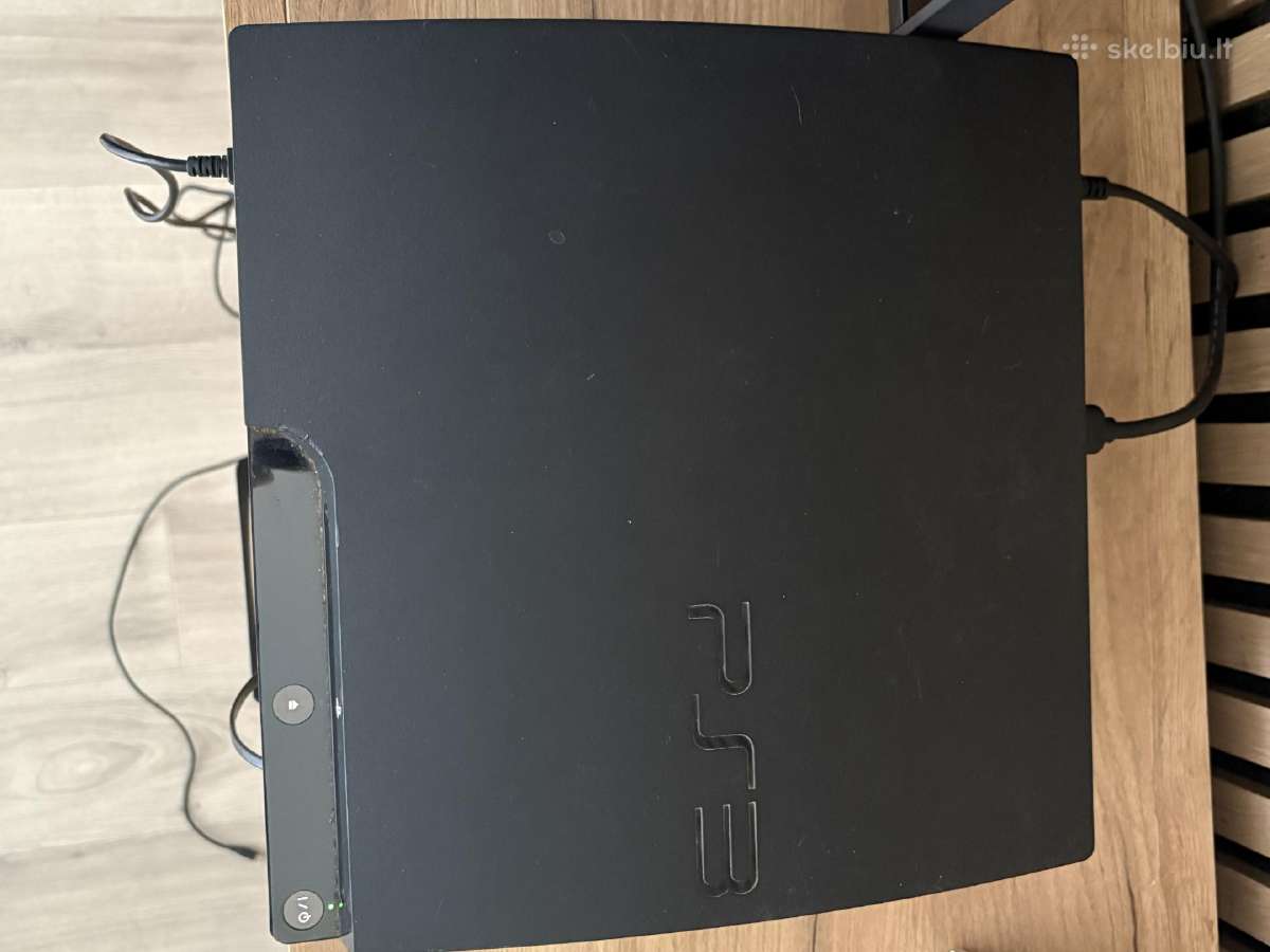 PS3 su žaidimais,vairu ir pulteliais