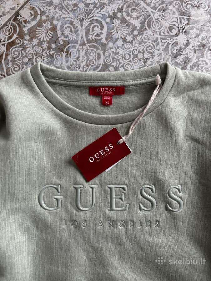 Guess megztukas