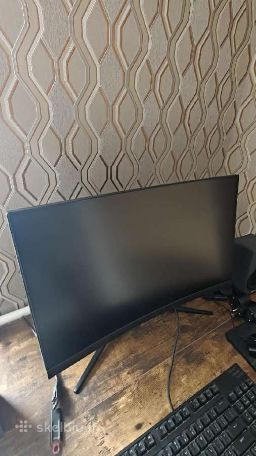 Msi lenktas 24 coliu monitorius.