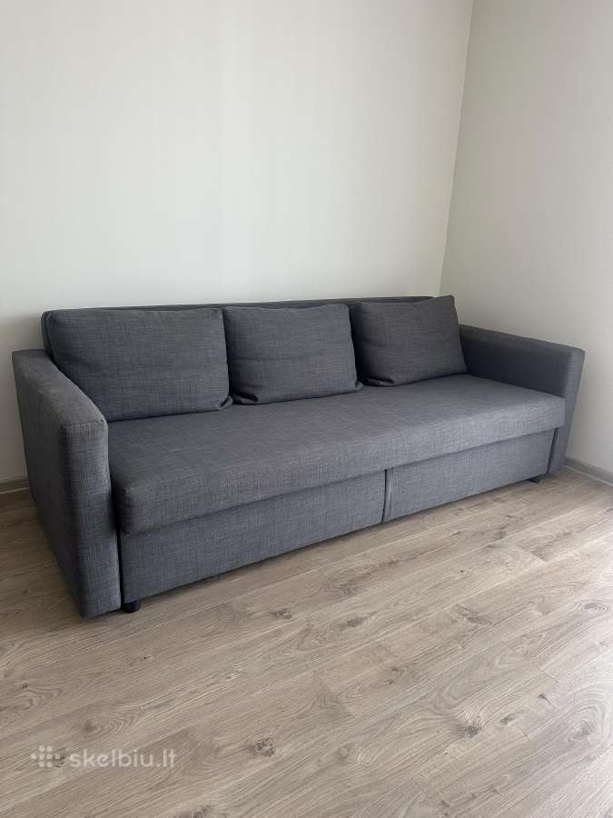 Pilka naudota sofa-lova