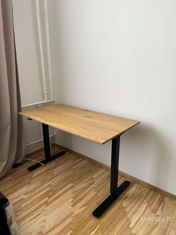 Elektrinis reguliuojamo aukščio stalas