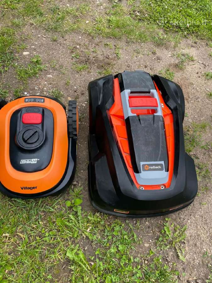 Redback ir Villager robotai žoliapjovės.