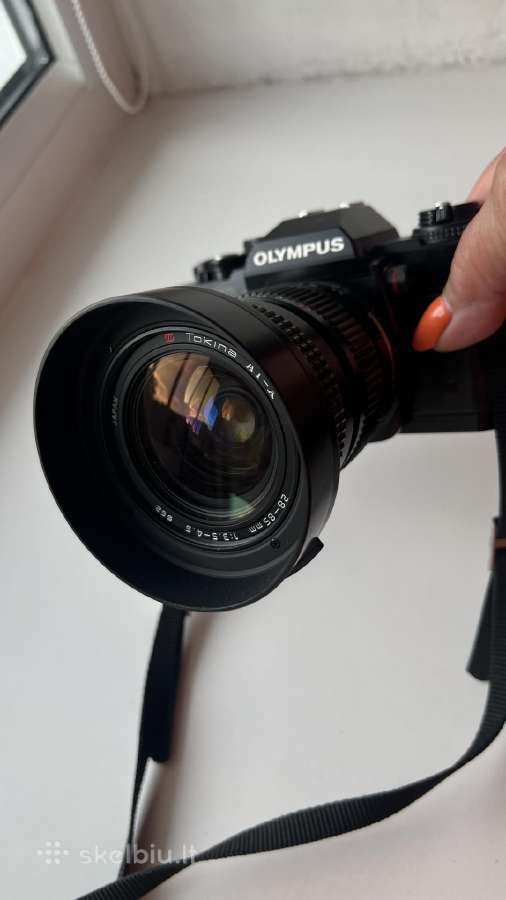 Juostinis fotoaparatas su objektyvu