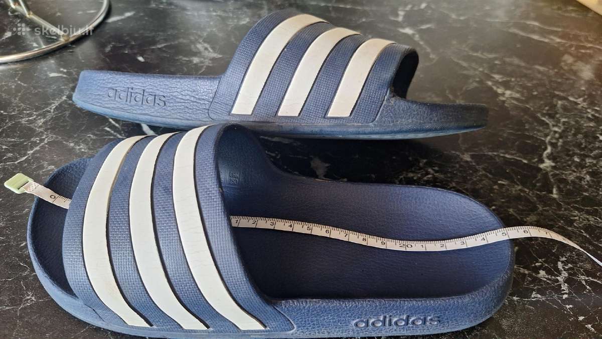Adidas tapkės