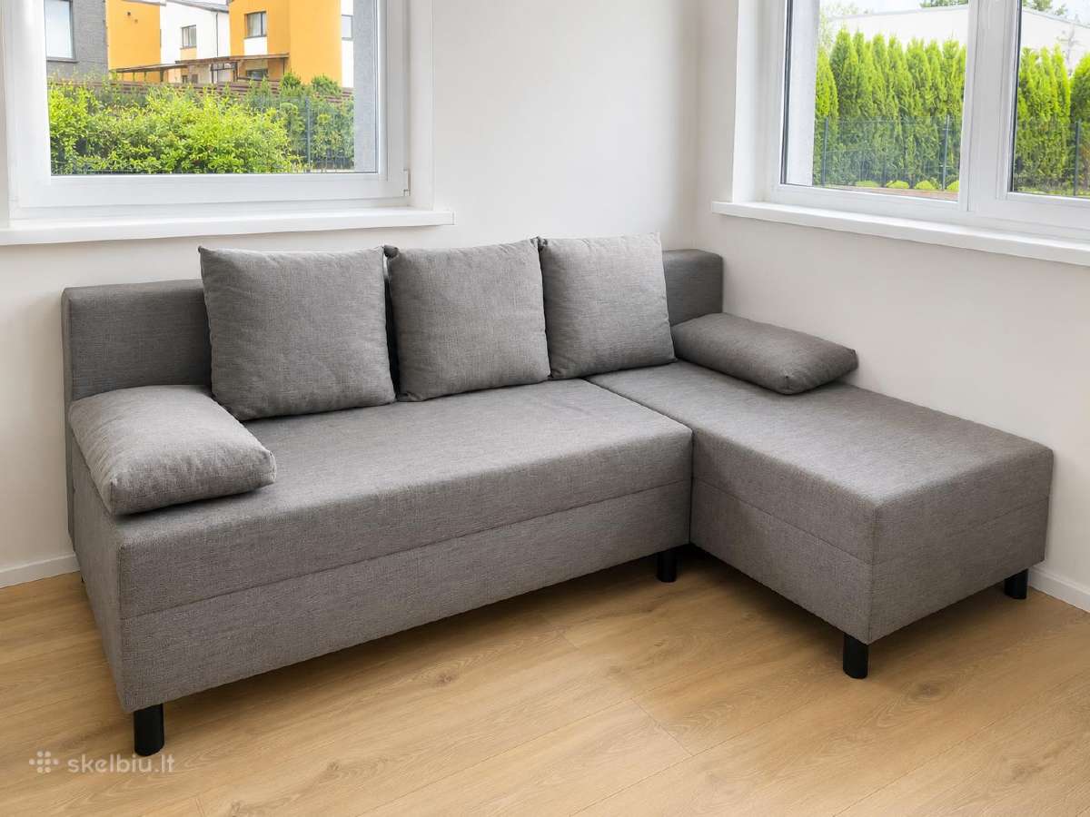 Kampinė sofa-lova su patalynės dėže