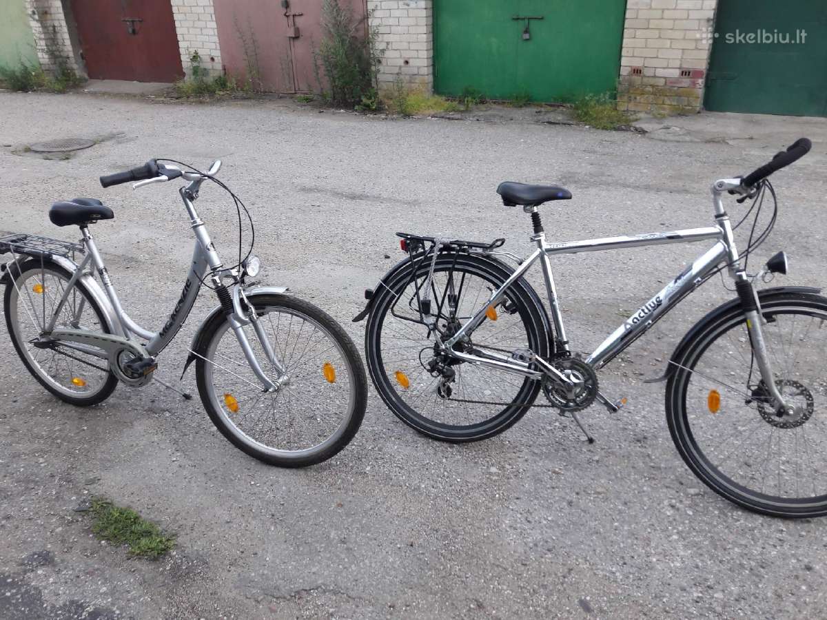 Du miesto dviračiai. 28 colių ir 26 colių