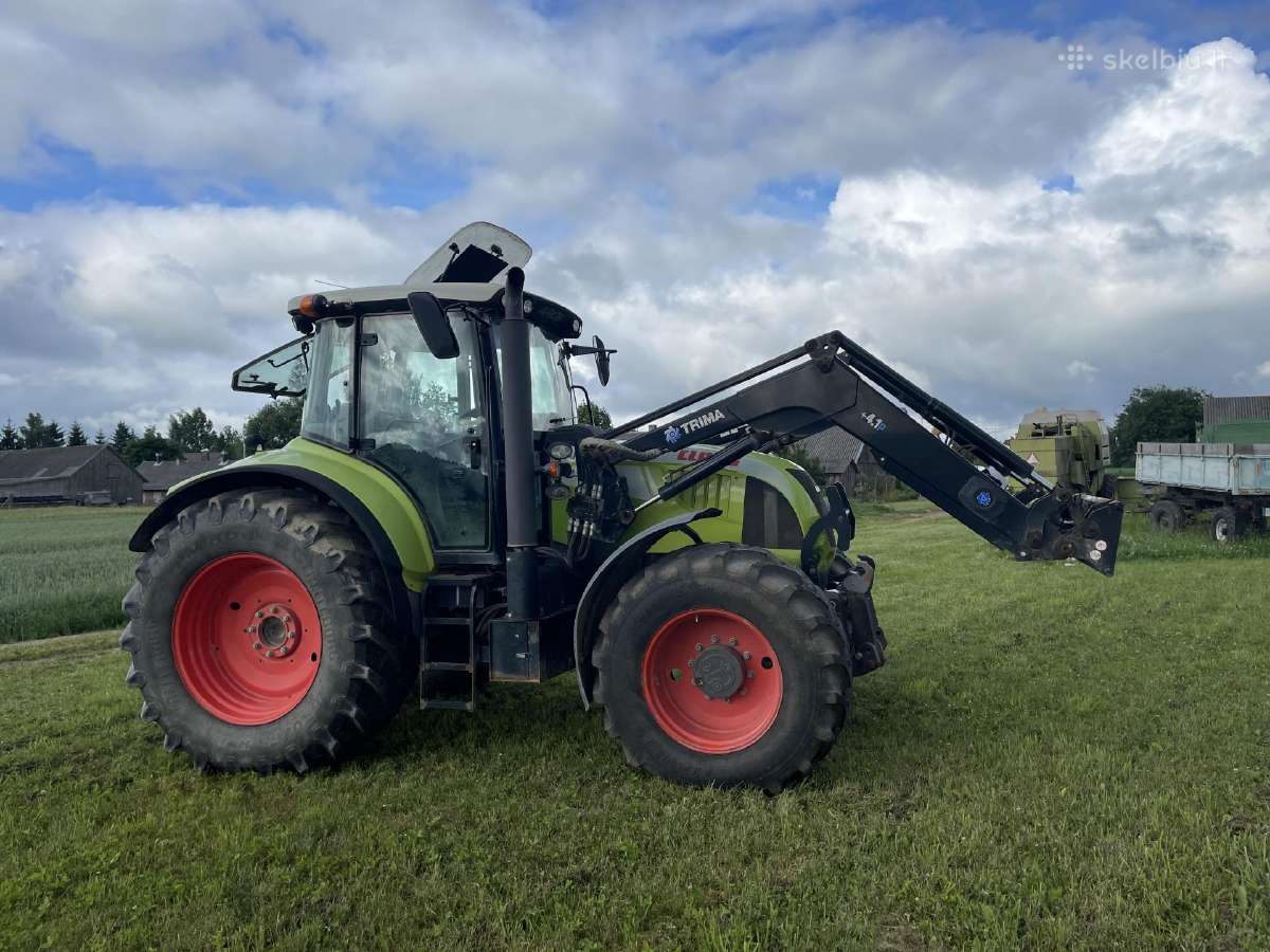 Claas Arion 640 (Cebis) su frontaliniu krautuvu