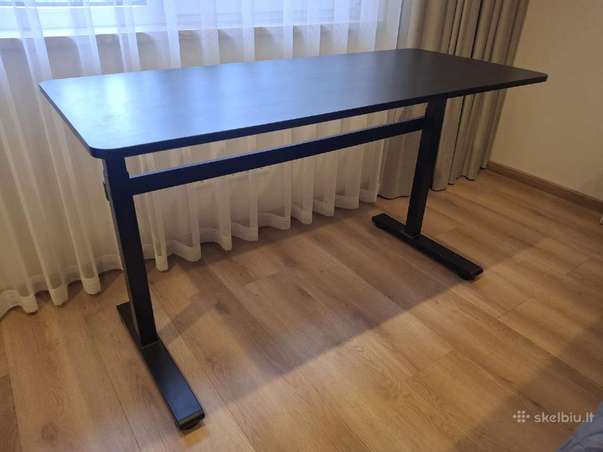 Mechaninis pakeliamas rašomasis stalas