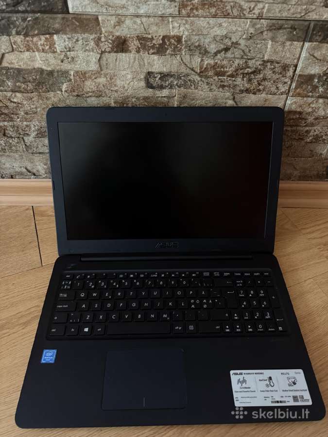 Asus R517s su pakrovėju
