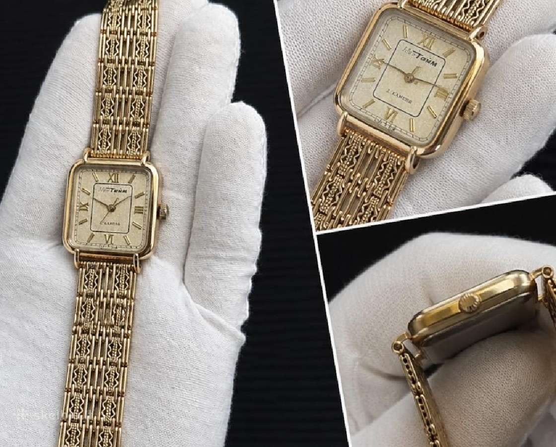 Elegantiškas laikrodis su auksine apyranke