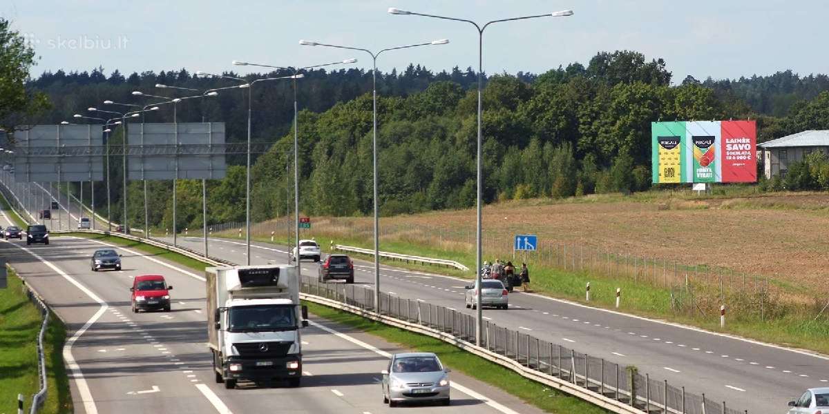 Reklaminis stendas šalia greitkelio A1 - nuotraukos Nr. 3