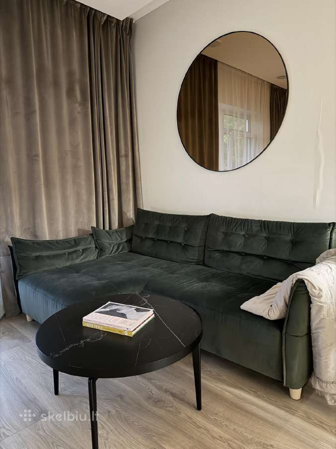 Sofa kampas su miegamuoju mechanizmu