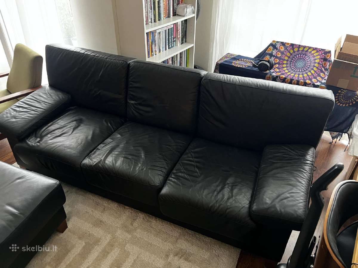 Juoda odinė sofa su pufu - nuotraukos Nr. 2