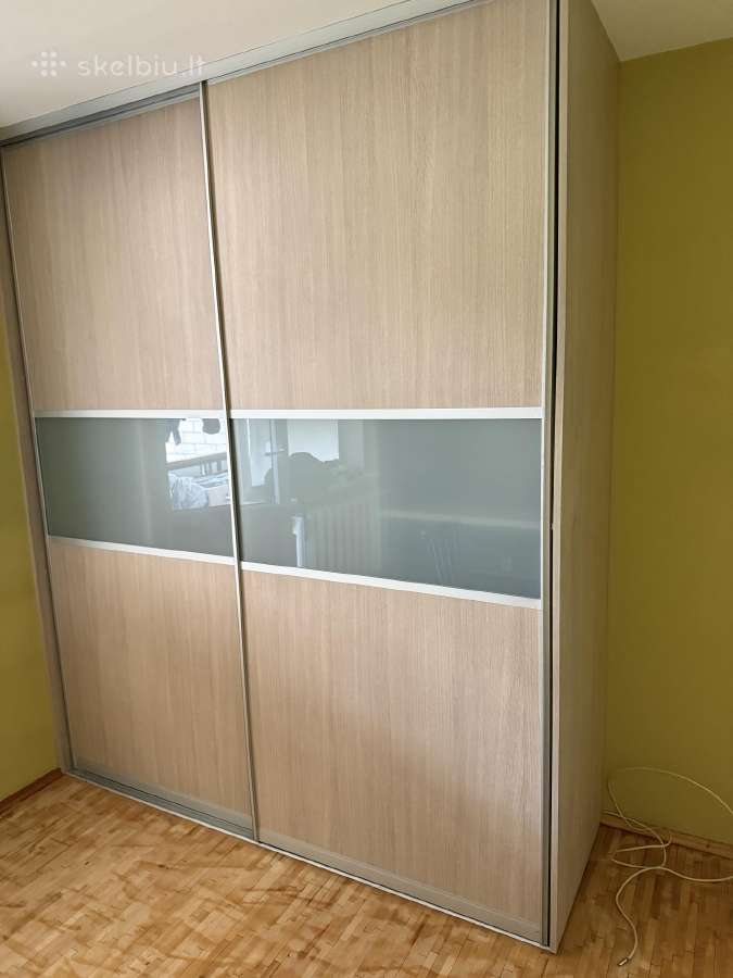 Dovanoju integruotą sieninę spintą
