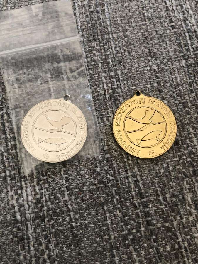 Žvejų ir medžiotojų deaugijos medaliai
