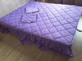 Lovos užklotas
