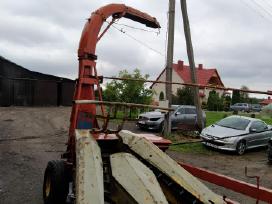 New Holland kukurūzo smulkintuvas