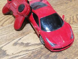 Raudona pulteliu valdoma Ferrari