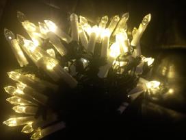 50 vnt. LED zvakes su segtuku,