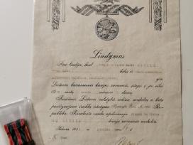 Savanorio medalis su dokumentu