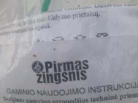 Priemone kojiniai apsimauti.
