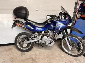 Honda nx650 dalimis dalys
