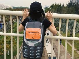 Išskirtinė mygtukinio telefono imitacijos kuprinė