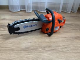 Husqvarna žaislinis grandininis pjūklas