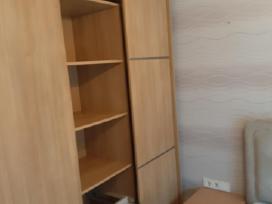Spinta su slankiojančia sistema
