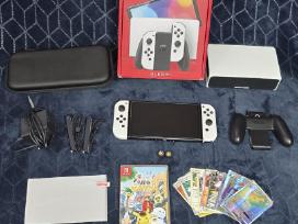 Nintendo switch oled su priedais