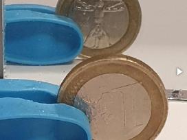 1 Euro 2002 Averso pasukimas reverso atžvilgiu