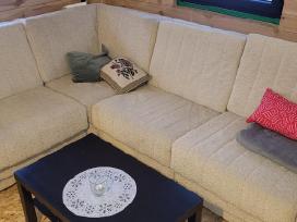 Sofa kampas su miegama funkcija