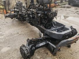 Traktorius New Holland 115 ardomas dalimis