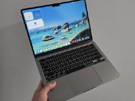 Perkame Apple MacBook kompiuterius