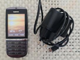 Nokia Asha 300(rm-781) su pakroveju.