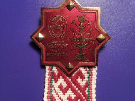 2009 m. dainų šventės vadovo ženklas